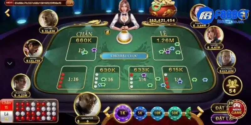 Người chơi quan sát bảng tổng cược xóc đĩa tại f88bet